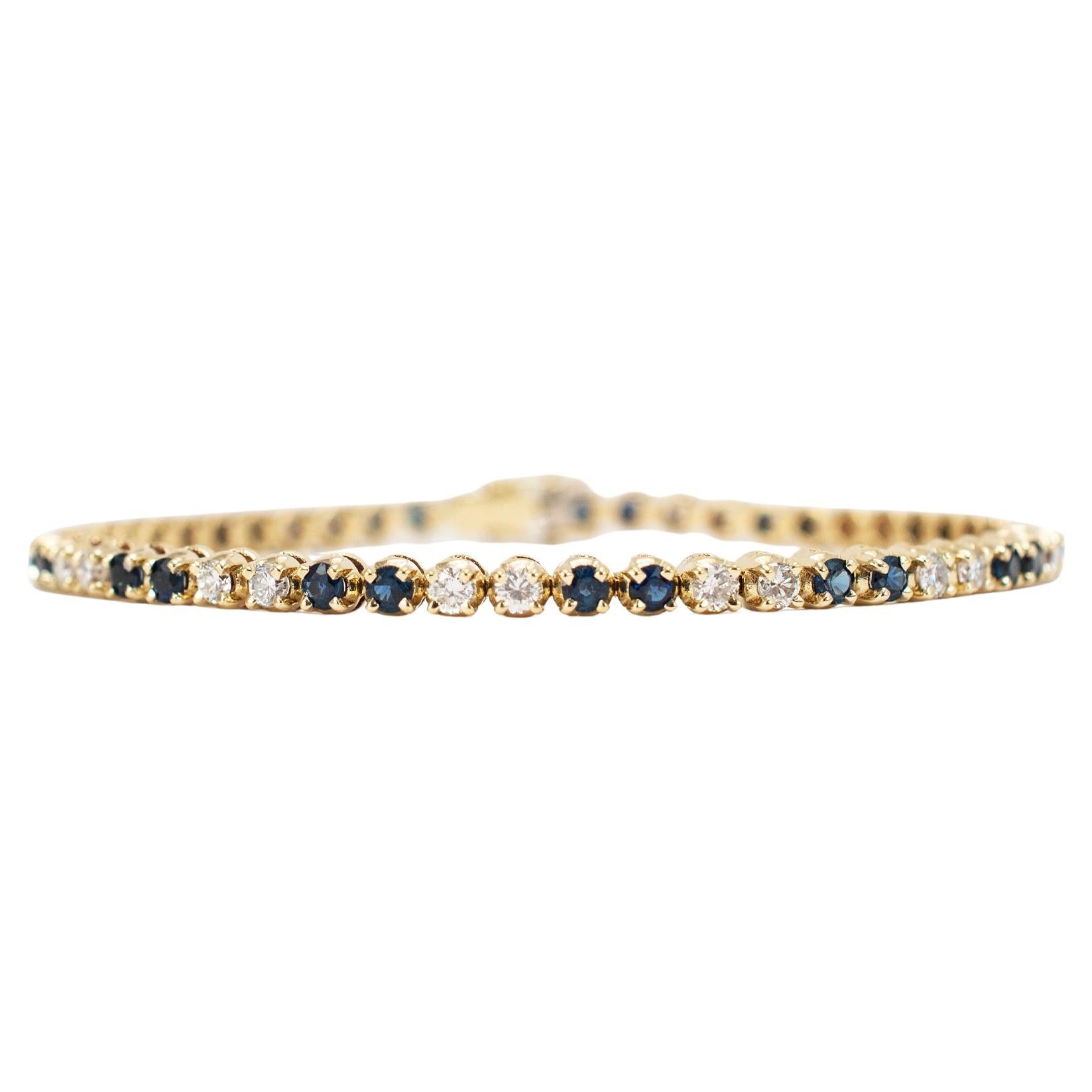 Bracciale tennis alternato da donna in oro giallo 14K con zaffiro e diamante
