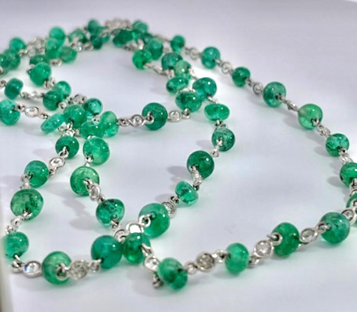 Art Deco Ladies 18 Karat Diamond and Emerald Long Beaded Chain Necklace 28.32 Carat For Sale