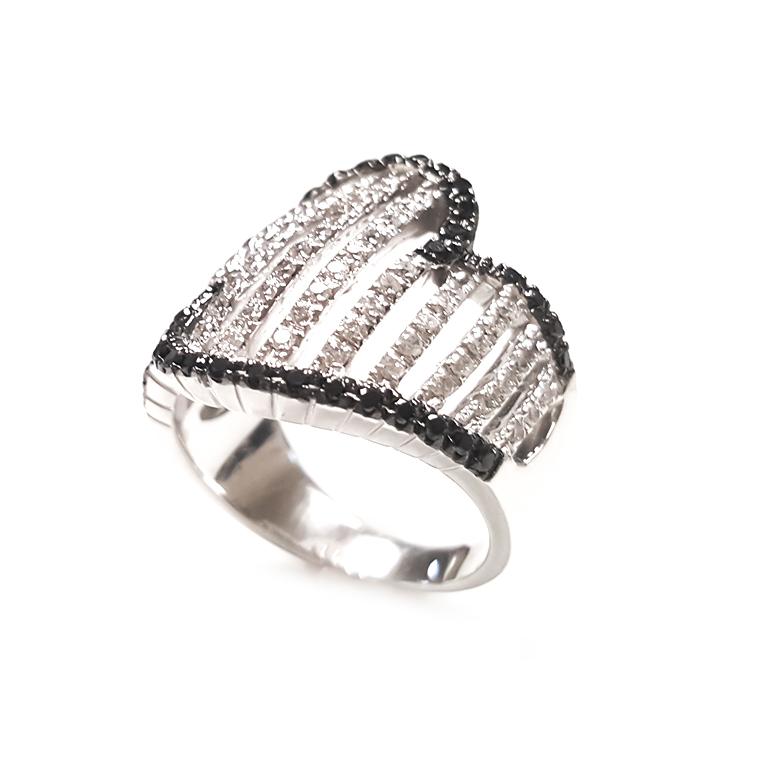 This Ladies 18k white gold black and white diamonds has  0.59 carats of perfectly Matched white diamond and 0.33 carats of black diamonds. Comfort fit ring for everyday use. Ring size 7