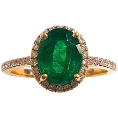 Ladies 18 Karat White Gold Emerald and Diamonds Ring