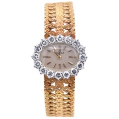 Ladies 18 Karat Yellow Gold Omega Diamond Bezel Dress Watch