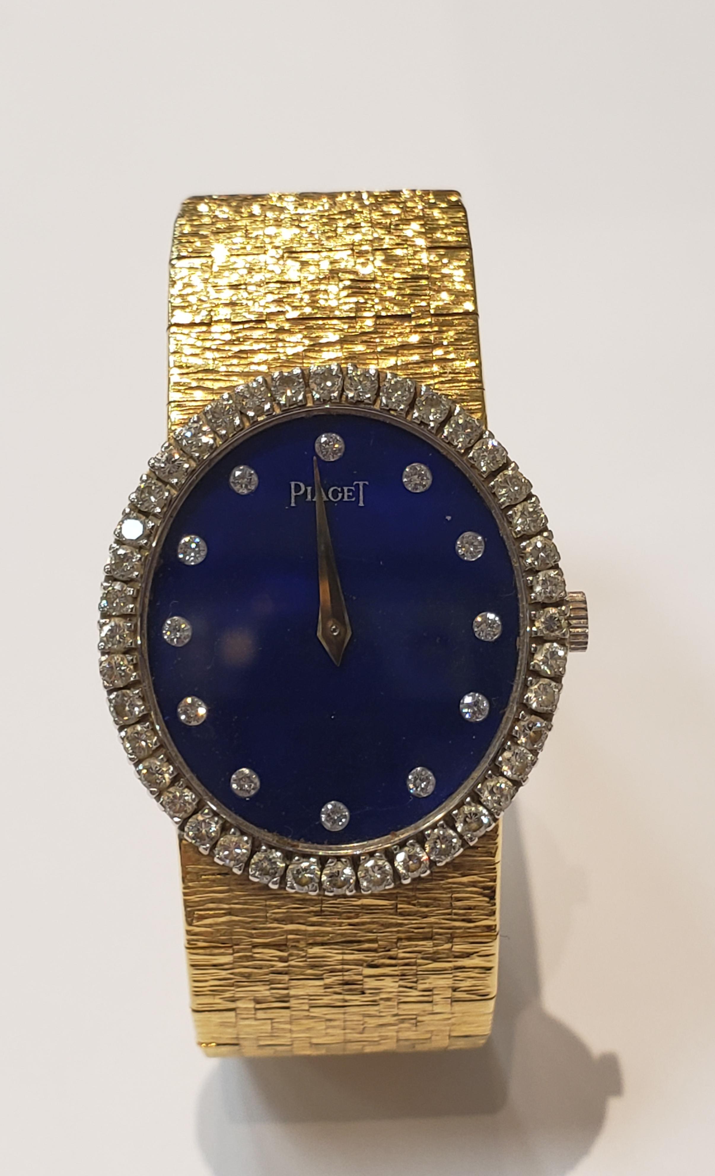 Contemporary Ladies 18 Karat Yellow Gold Piaget Watch with Lapis Dial and Diamond Bezel