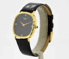 Ladies 18k gold and black dial Longines wristwatch, set with diamond hour marker