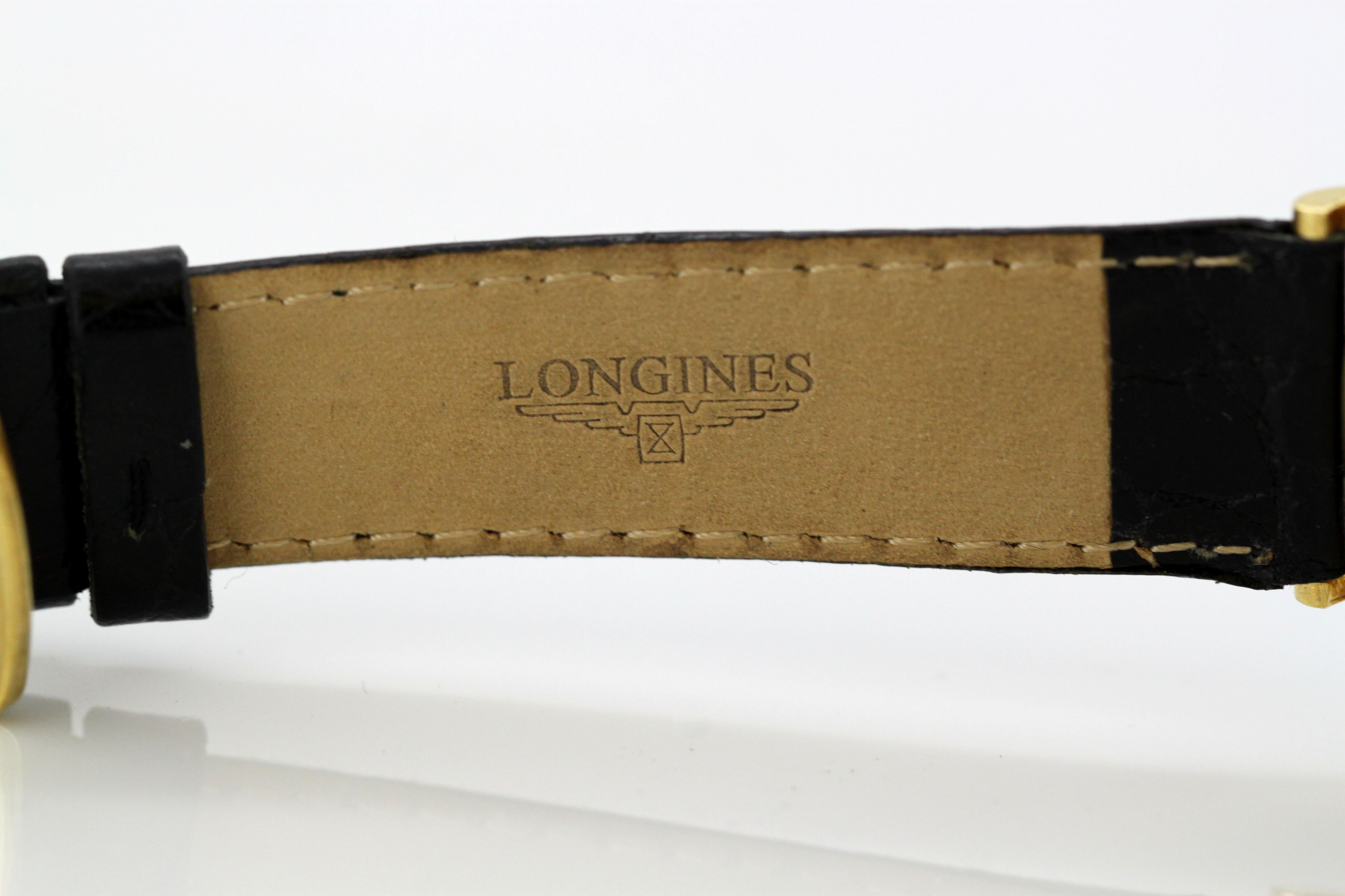 Ladies 18k gold and black dial Longines wristwatch, set with diamond hour marker 1