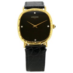 Montre-bracelet Longines pour femme:: en or 18 carats et cadran noir:: avec index en diamant