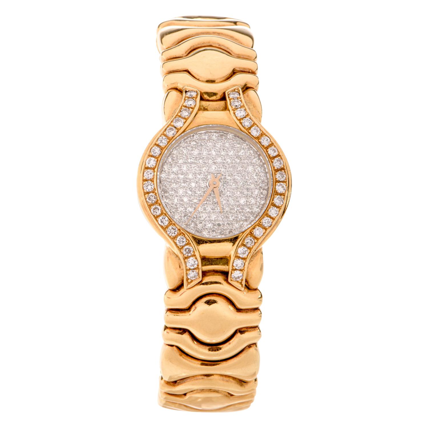 Not just a watch, this piece is also an incredibly stylish cuff bracelet.

Featuring an all Diamond, pave set dial and bezel, this 

quartz battery movement has gold hands and a scratch

resistant sapphire crystal. 

Measuring appx. 24mm in diameter
