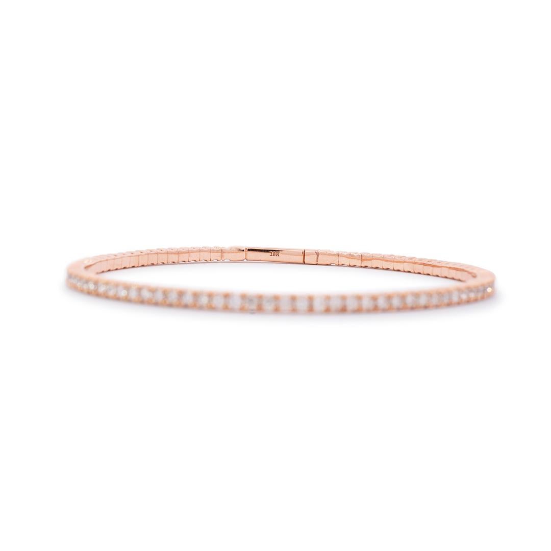 Lady's custom made polished 18K rose gold, diamond bangle, tennis bracelet. The bracelet is 2.50mm thick and measures approximately 6.75 inches in length and weighs a total of 9.86 grams. Engraved with 