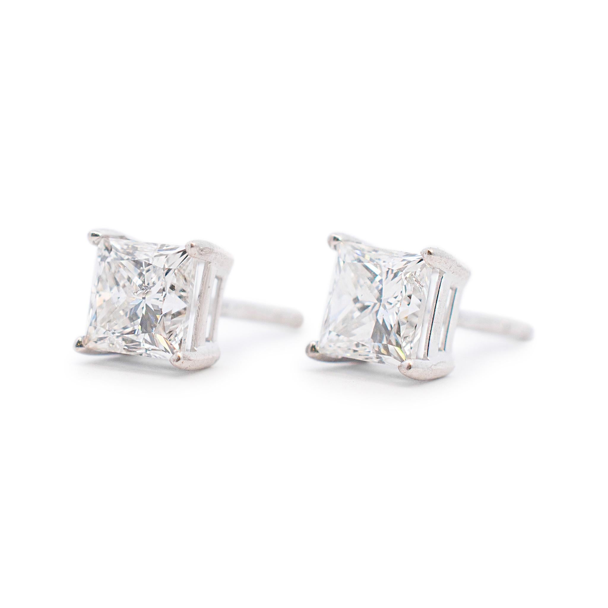 Gender: Ladies

Metal Type: 18K White Gold 

Length: 0.25 inches

Weight: 2.36 grams

Ladies 18K white gold diamond contemporary-style stud earrings with 