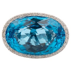 Ladies 18K White Gold Blue Topaz Halo Diamond Cocktail Ring