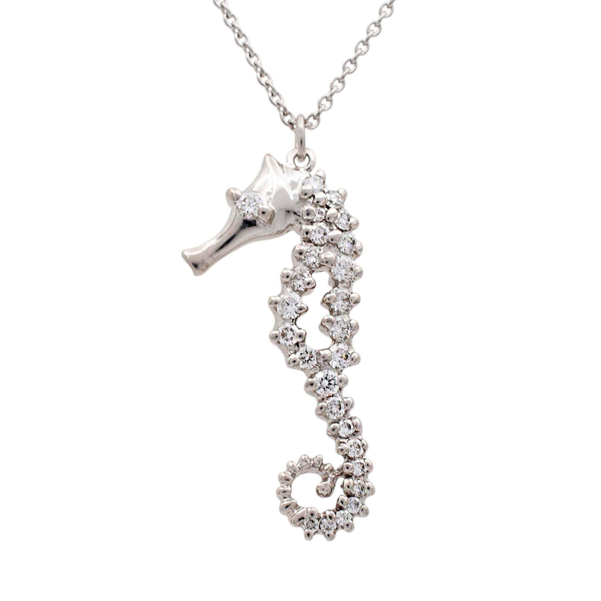 Gender: Ladies

Metal Type: 18K White Gold

Length: 16.00 inches

Pendant Mesurements: 35.00mm x 10.50mm

Weight: 3.54 grams

18K white gold single strand collar diamond necklace. Engraved with 
