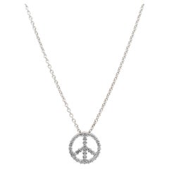 Collana con ciondolo a forma di segno di pace in oro bianco 18 carati per donna