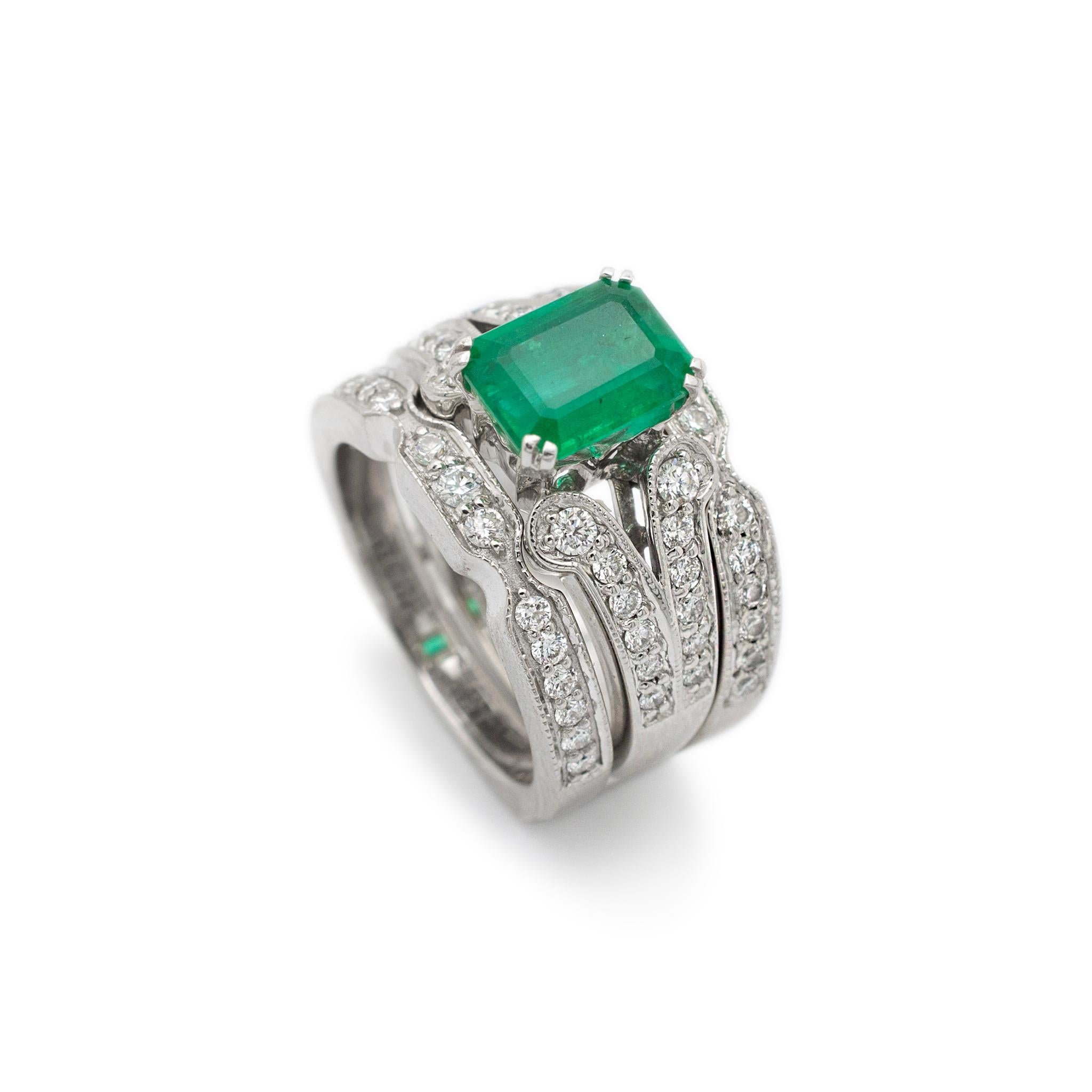 Gender: Ladies

Metal Type: 18K White Gold

Size: 5.5

Width: 2.85 mm

Ring measures approximately in width: 2.85 mm

Jacket measures in width: 8.50 mm

Weight: 15.69 grams

18K White Gold Diamond and Emerald Cocktail Ring with a soft-square shank.