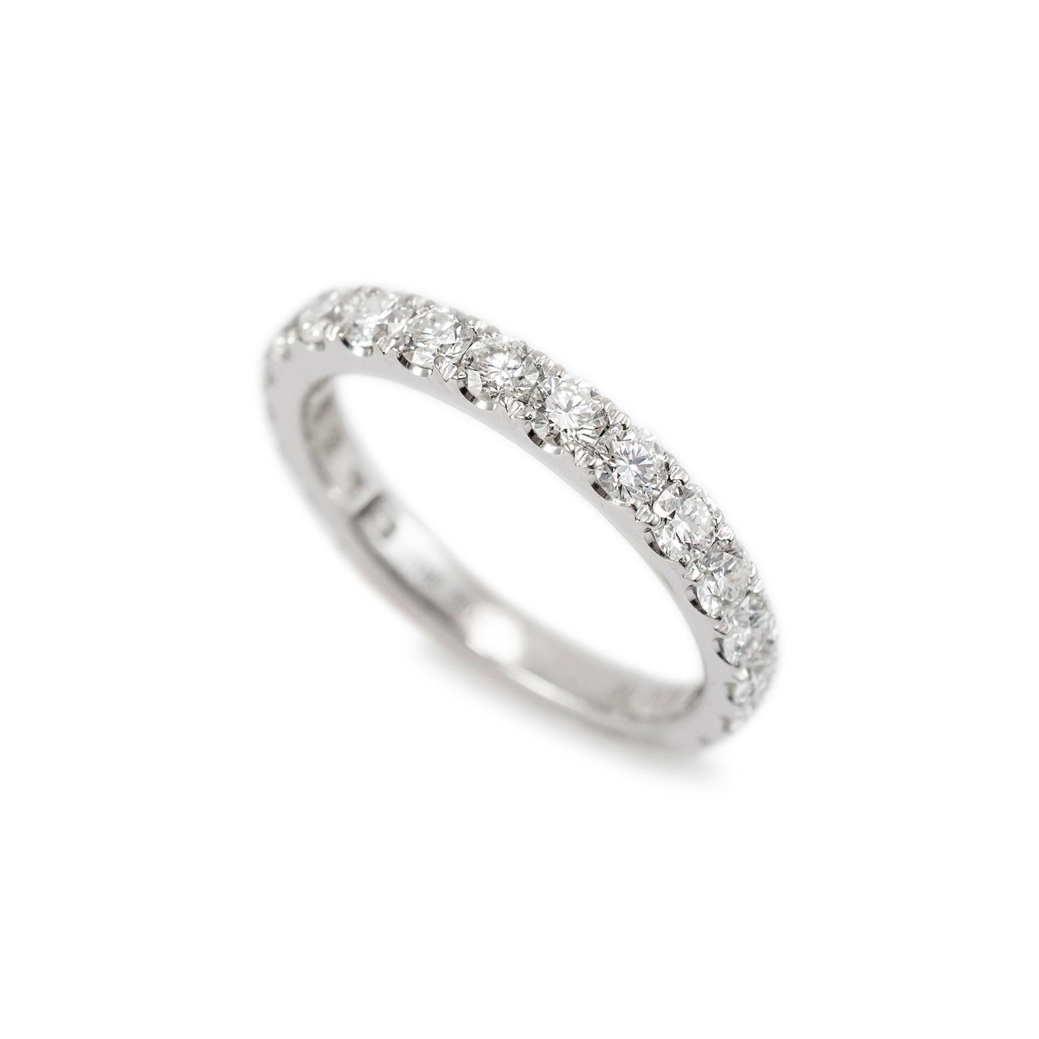 Gender: Ladies

Metal Type: 18K White Gold 

Size: 6.5

Width: 2.50 mm

Weight: 2.75 Grams

18K White Gold diamond wedding band with a half-round shank. The metal was tested and determined to be 18K white gold. Engraved with 