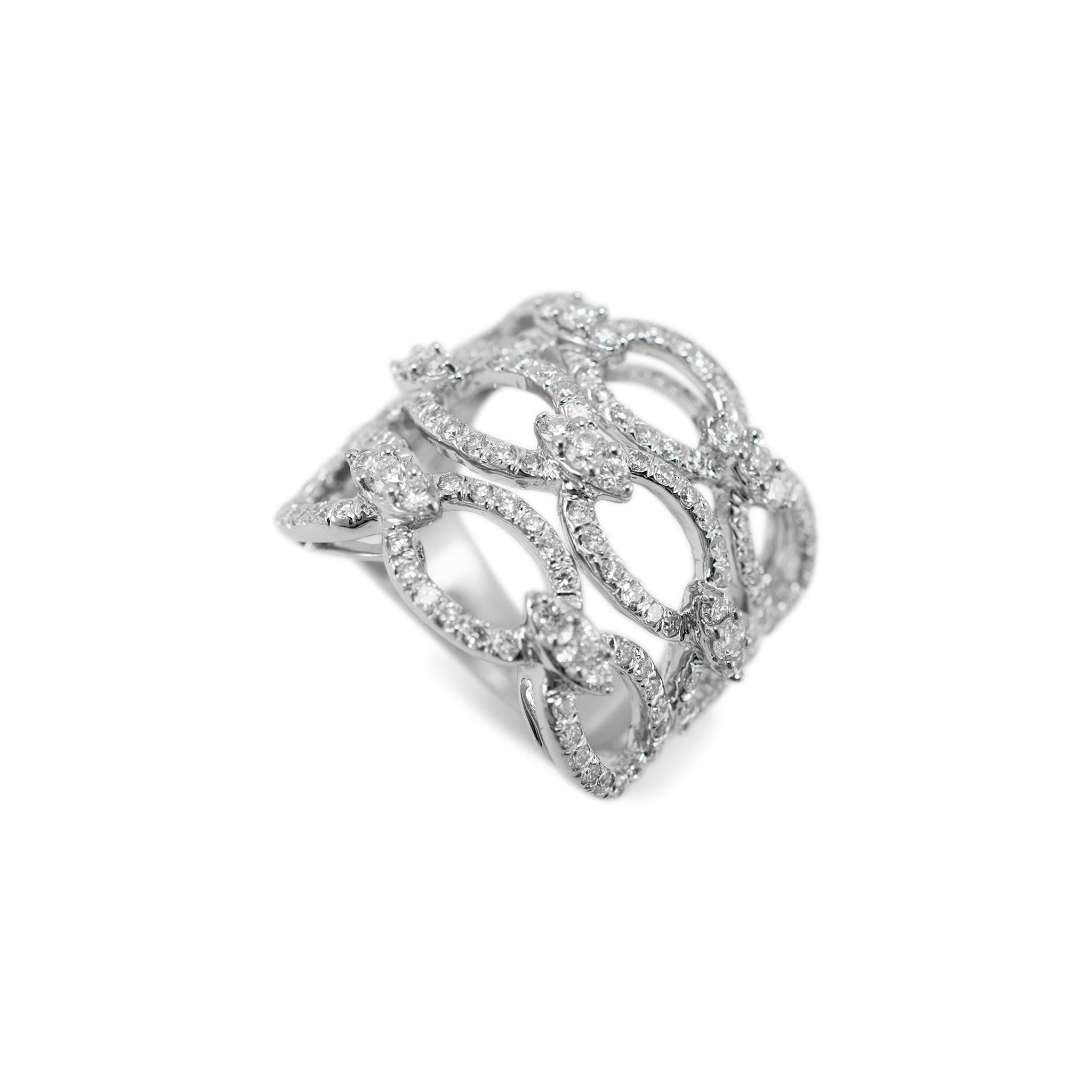 Gender: Ladies

Metal Type:  18K White Gold

Ring Size: 6

Width: 20.40 mm tapering to 3.85 mm

Weight: 11.58 grams

One ladies 18K white gold interlocking diamond band with a tapered, comfort-fit shank. The metal was tested and determined to be 18K