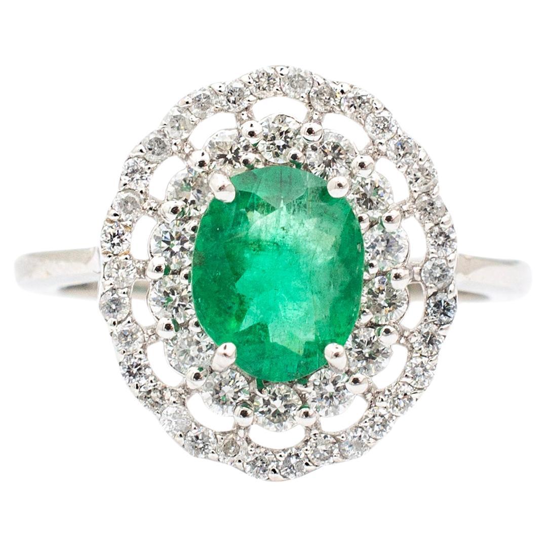 Ladies 18k White Gold Oval Emerald Halo Diamond Cocktail Ring For Sale