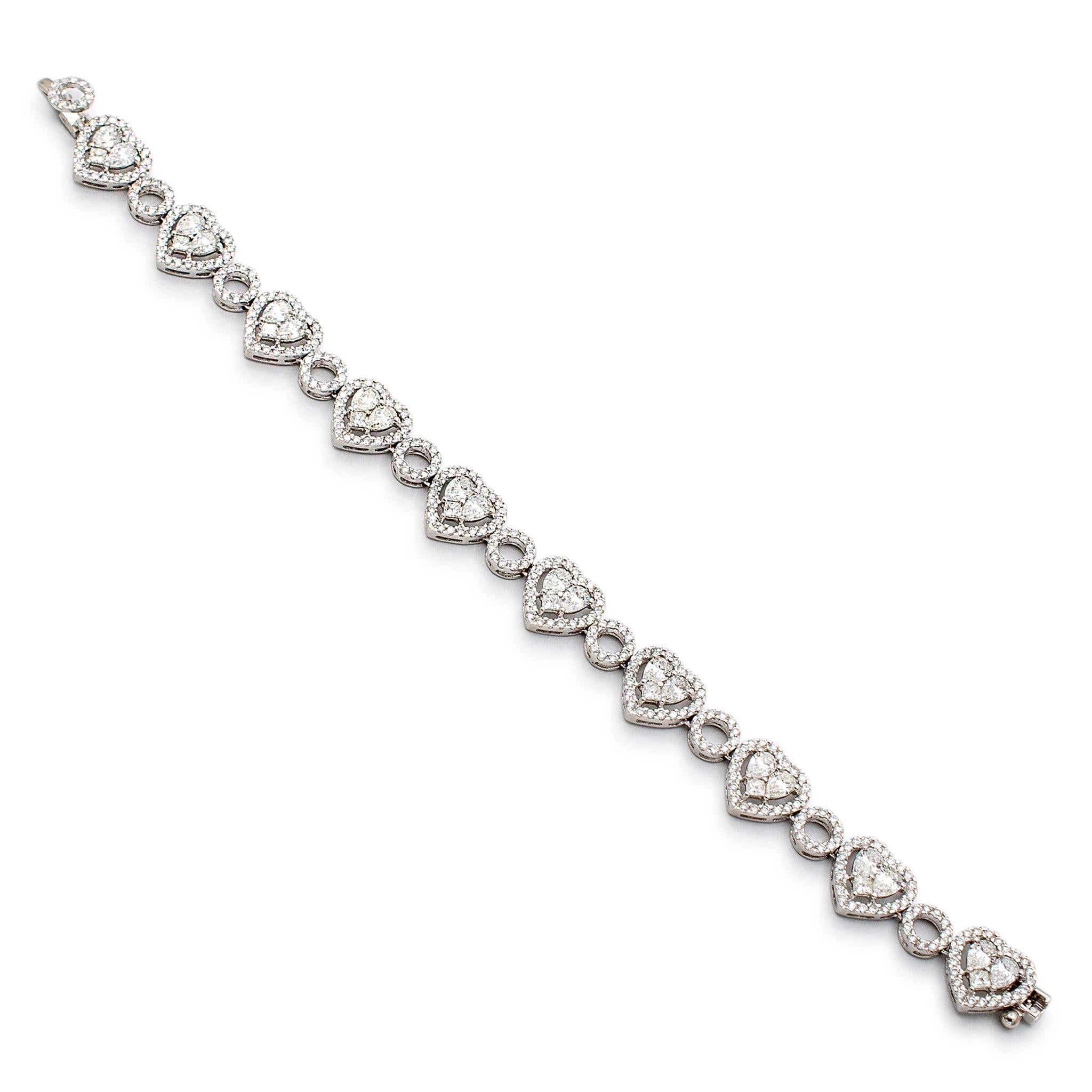 Gender: Ladies

Metal Type: 18K White Gold

Length: 6.5 Inches

Width: 11.00 mm

Weight: 18.07 grams

Ladies 18K white gold diamond link tennis bracelet. Engraved with 