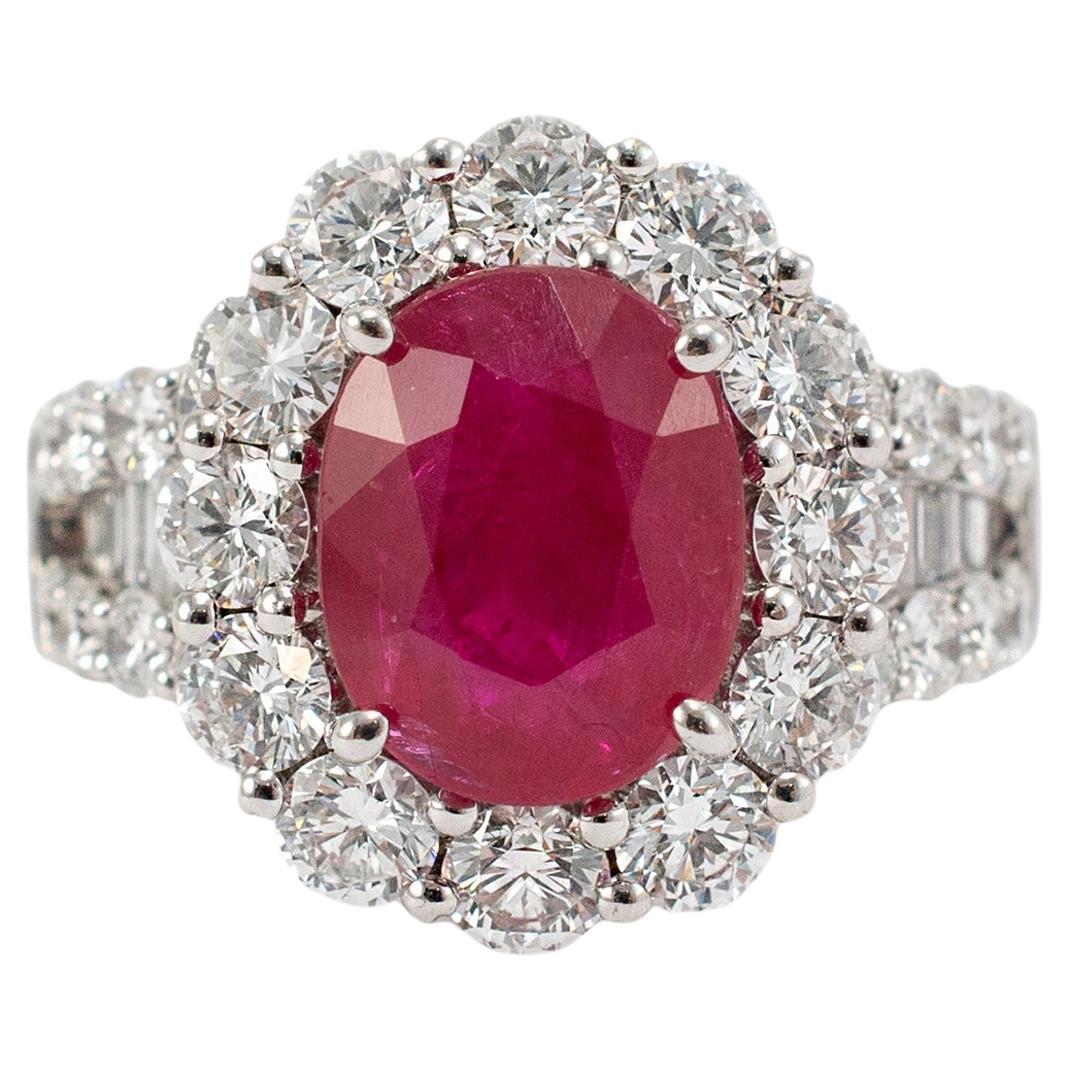 Ladies 18K White Gold Ruby Halo Accented Diamond Cocktail Ring For Sale
