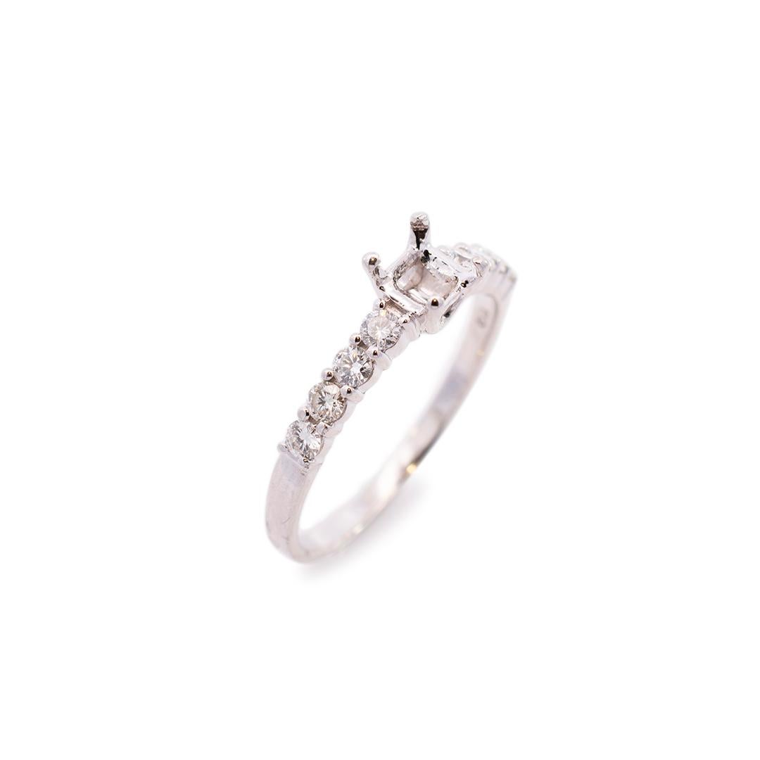Gender: Ladies

Metal Type: 18K White Gold

Size (US): 9.25

Shank Width: 1.90mm

Hold a center stone of Princesses Cut, Square Emerald or Any Square Shape measures approximately 4.30mm to 5.20mm in diameter.

Weight: 3.28 grams

Ladies 18K white