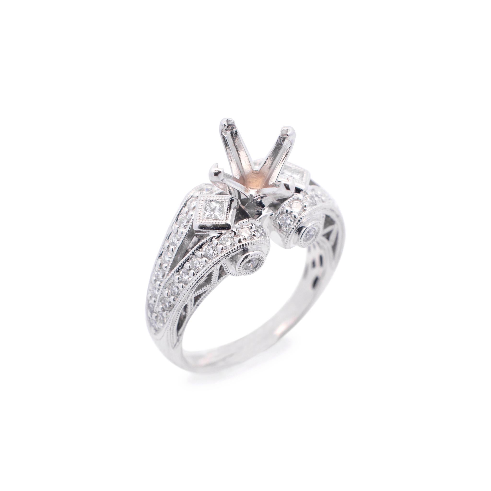 Gender: Ladies

Metal Type: 18K White Gold

Size (US): 6

Shank Width: 9.65mm tapering to 2.10mm

Can Hold a center stone of Princesses Cut Square Emerald or Any Square Shape measures approximately 6.20mm to 6.70mm in diameter.

Weight:
