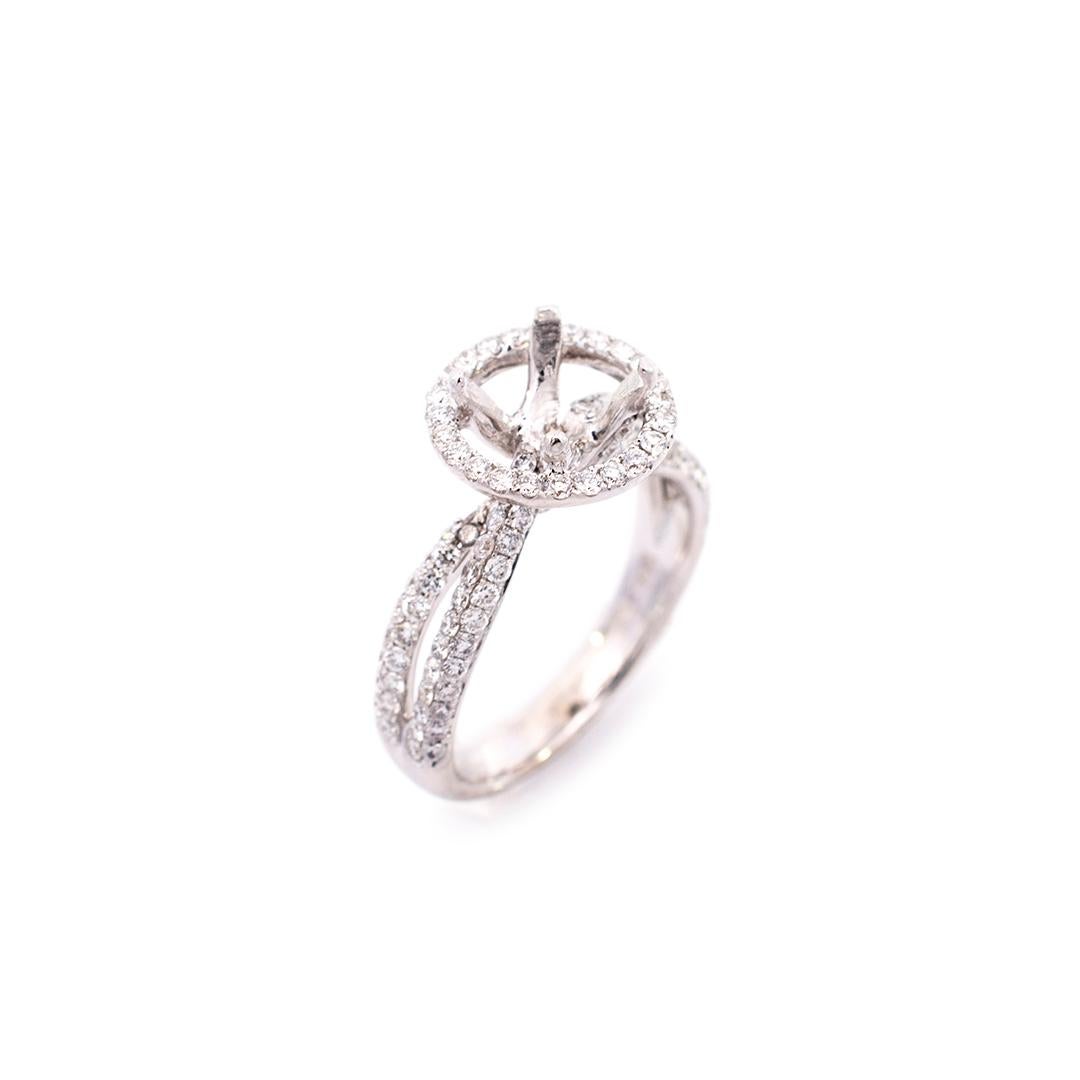 Gender: Ladies

Metal Type: 18K White Gold

Size (US): 6.25

Shank Width: 2.80mm

Head Measurements: 11.20mm

Center Stone of Round Shape Measures 7.20mm to 7.40mm in Diameter

Weight: 5.37 grams

Ladies polished rhodium plated 18K white gold
