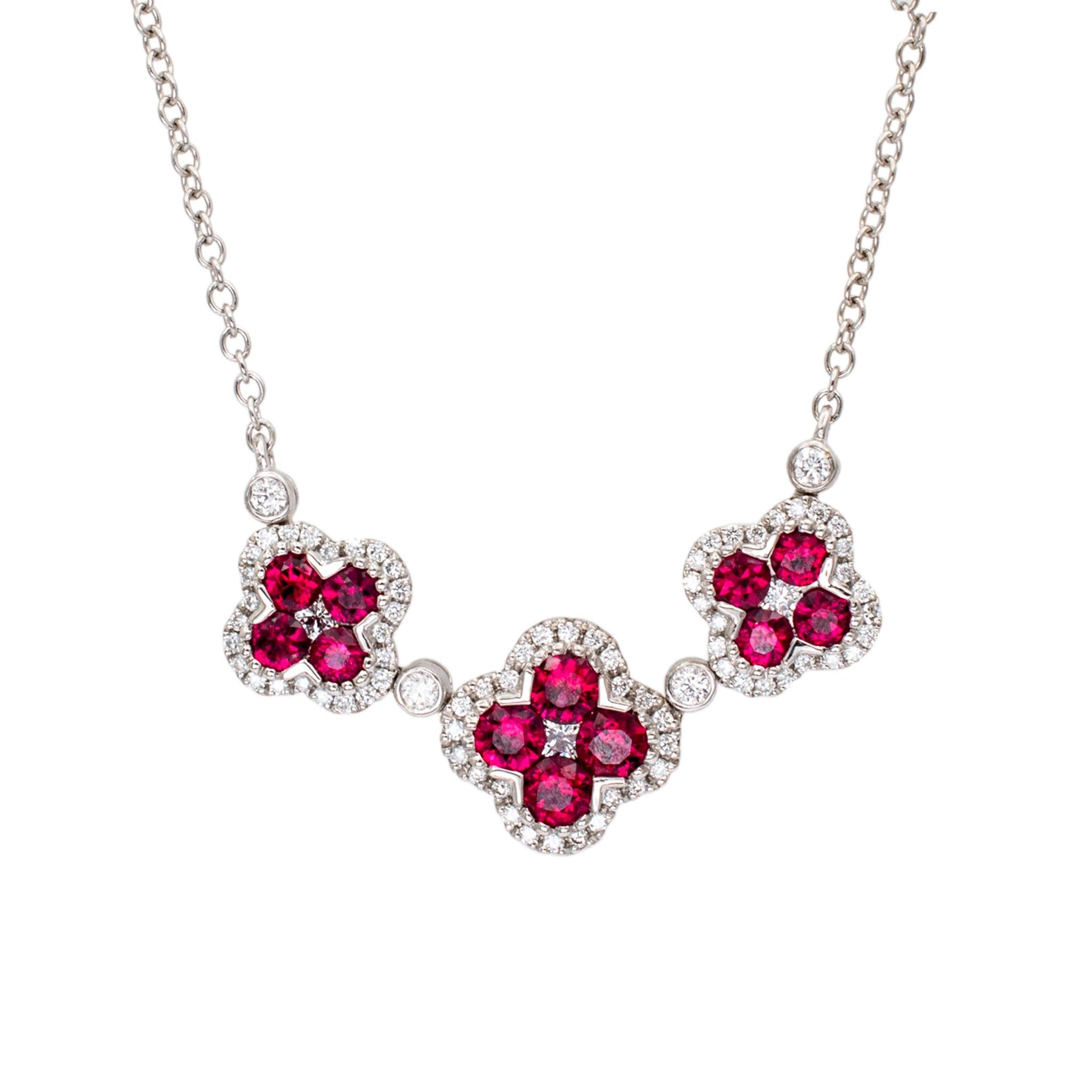 Gender: Ladies

Metal Type: 18K White Gold

Length: 16.00 Inches

Chain Width: 1.30 mm

Largest Flower Measurement: 9.80mm x 9.80mm

Weight: 4.50 grams

Ladies 18K white gold single strand collar diamond and ruby necklace. The metal was tested and