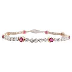 Bracciale tennis da donna in oro bianco e giallo 18 carati con diamanti e zaffiri rosa