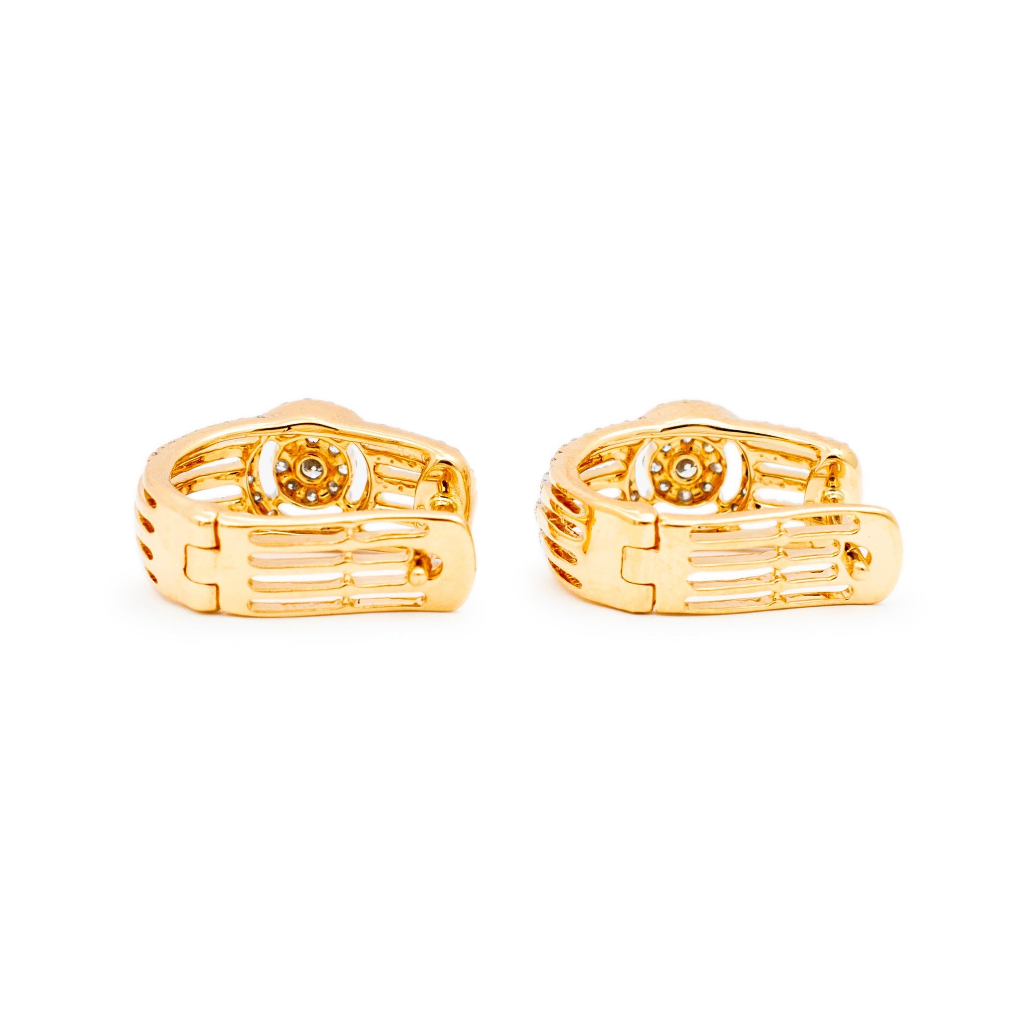 Gender: Ladies

Metal Type: 18K White Gold

Length: 0.75 inches

Width: 14.55 mm

Weight: 6.40 grams 


Ladies 18K yellow gold diamond huggie style cluster earrings with 