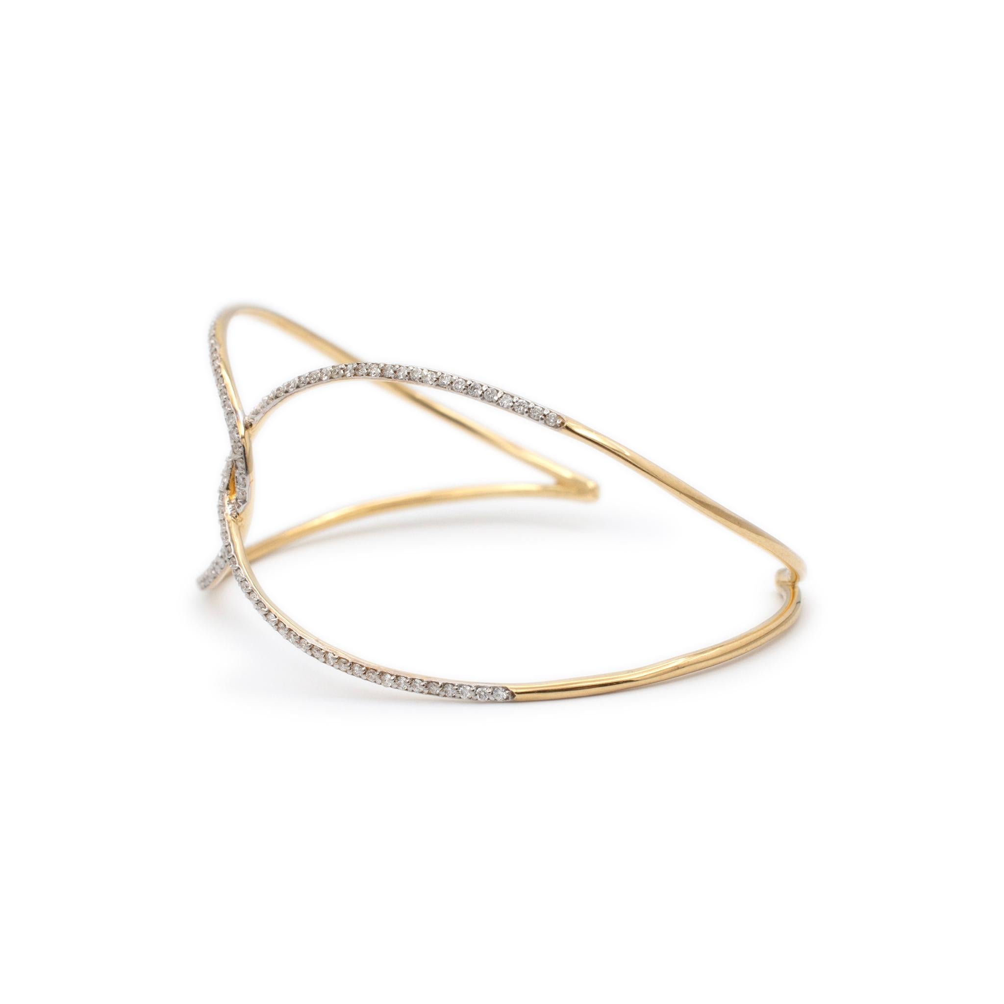 Gender: Ladies

Metal Type: 18K Yellow Gold

Length: 6.00 Inches

Width: 26.00 mm

Weight: 8.45 grams

18K yellow gold diamond cuff bracelet. The metal was tested and determined to be 18K yellow gold.

Pre-owned in excellent condition. Might show