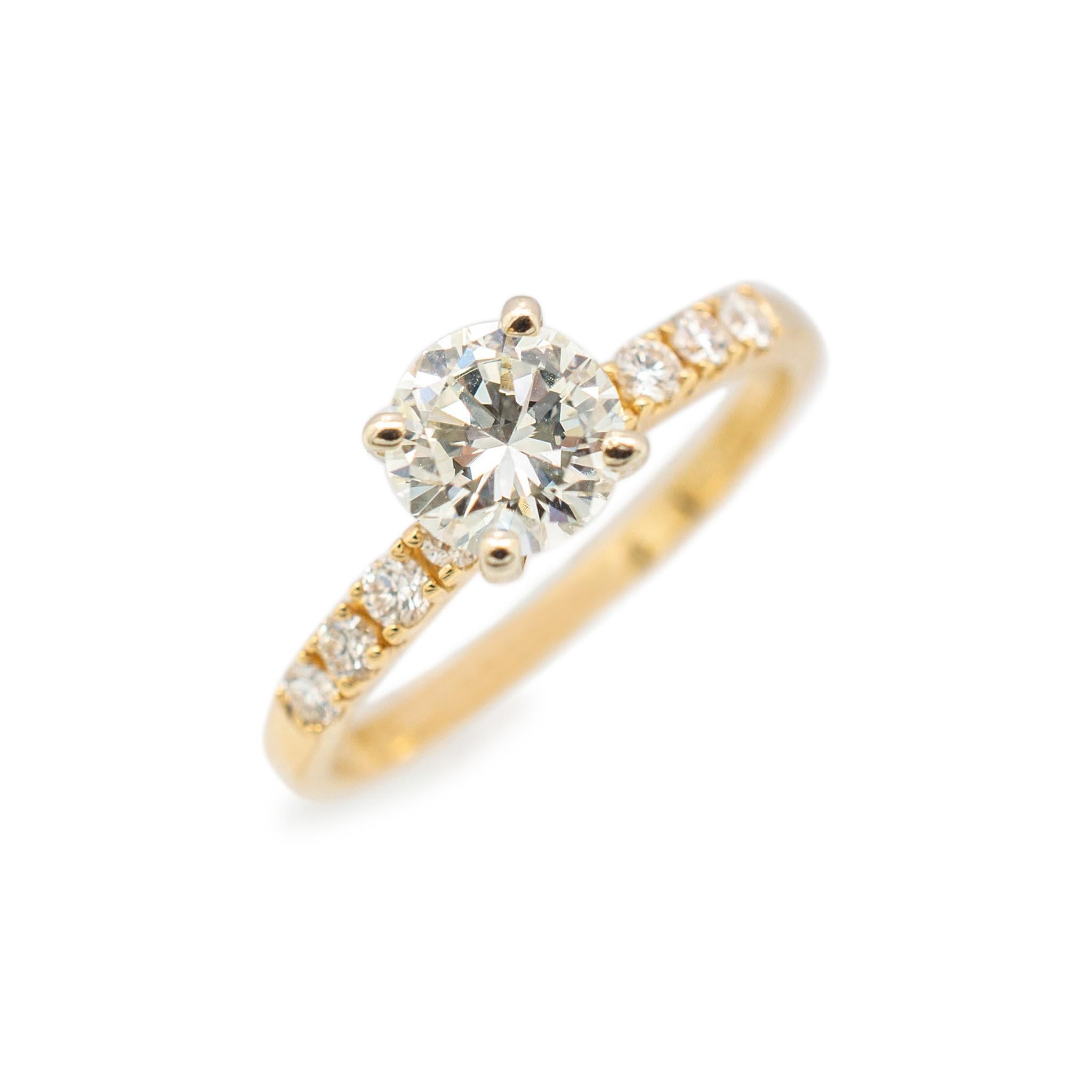 Gender: Ladies

Material: 14K Yellow Gold

Ring Size: 6

Shank Width: 1.90 mm

Weight: 2.20 grams

Ladies 18K yellow gold diamond solitaire engagement ring with a half round shank.
Engraved with 