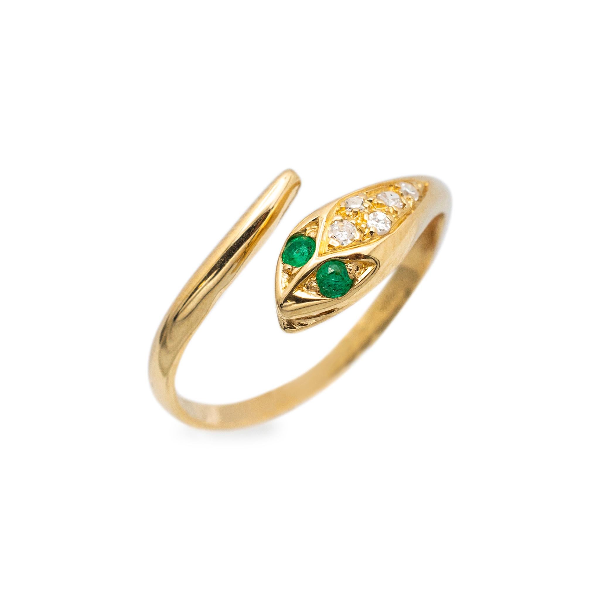 Gender: Ladies

Metal Type: 18K Yellow Gold

Size: 8

Shank Maximum Width: 8.45 mm

Weight: 2.33 grams

Ladies 18K yellow gold diamond and emerald cocktail ring with a half round shank. The metal was tested and determined to be 18K yellow gold.