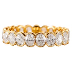 Alianza de boda de oro amarillo de 18 quilates con diamantes ovalados de 3,17 ct
