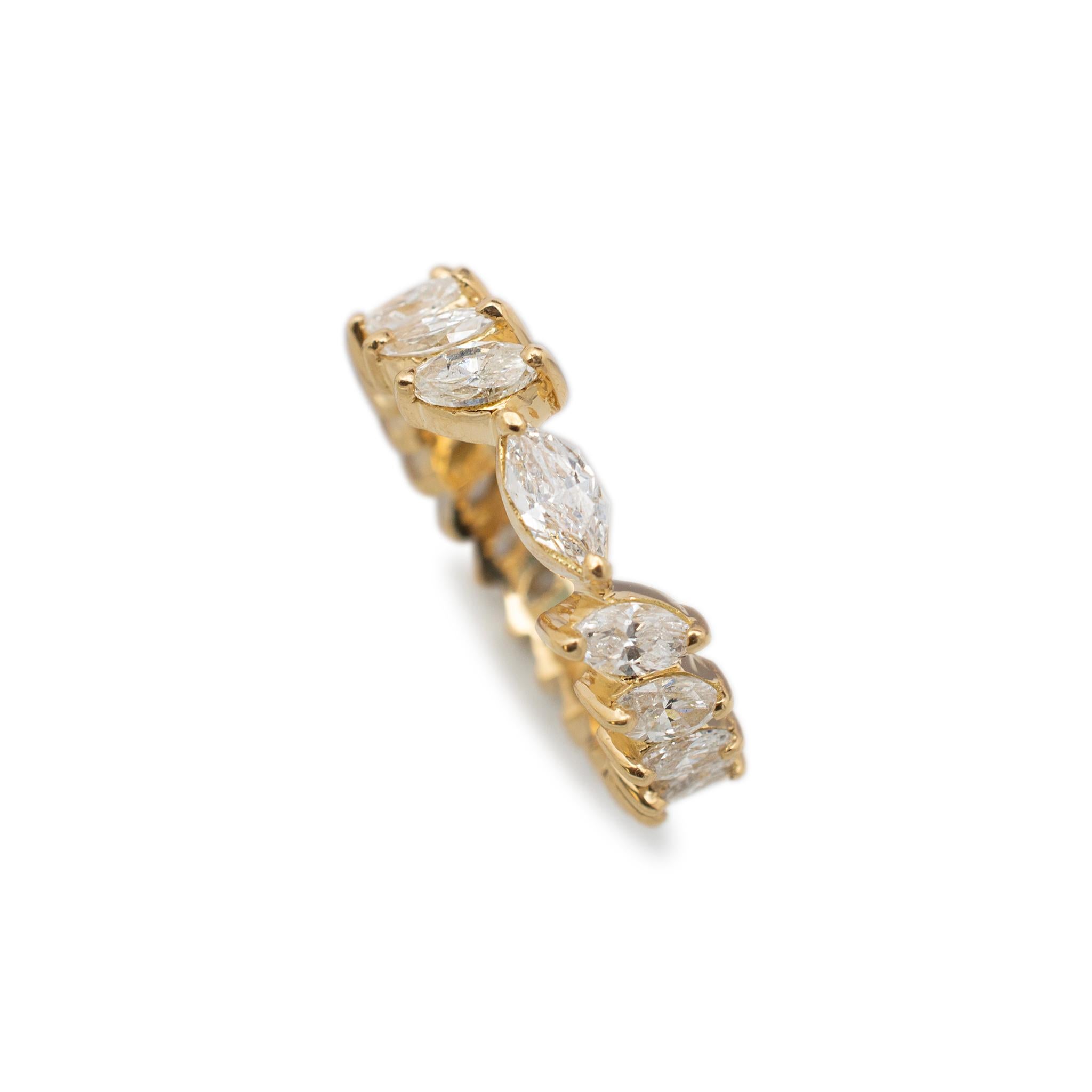 Gender: Ladies

Metal Type: 18K Yellow Gold

Ring Size: 6.5

Width: 6.00 mm

Weight: 5.78 grams

Ladies 18K yellow gold, diamond wedding, eternity band with a comfort-fit shank. The metal was tested and determined to be 18K yellow gold. In excellent