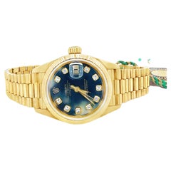 Montre-bracelet Rolex President en or jaune 18 carats pour dames