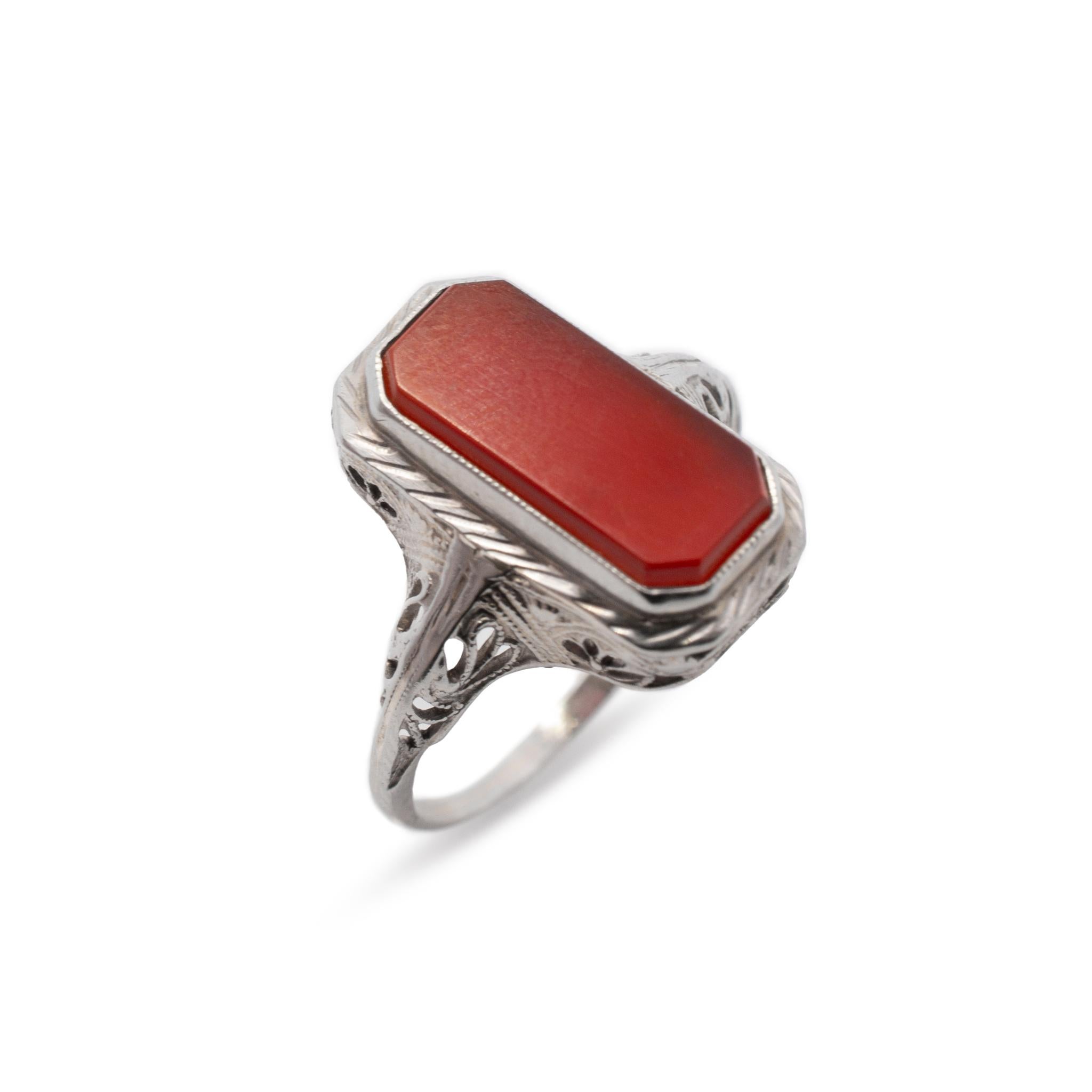 Gender: Ladies

Metal Type: 14k White Gold

Size: 7

Weight: 2.80 Grams

This antique ring is made of 14K white gold with an orange sunstone as a center piece.

Pre-owned in excellent condition. Might show minor signs of wear.

One (1) natural,