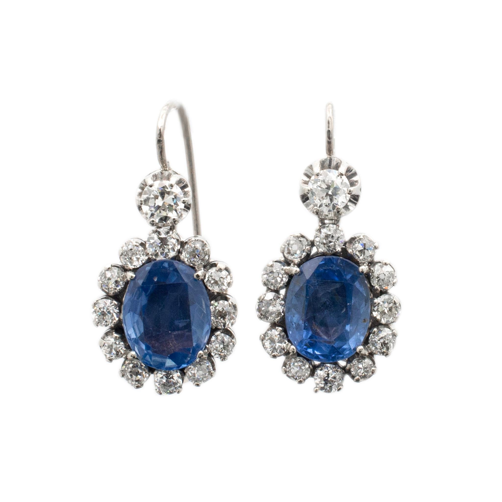Gender: Ladies

Metal Type: Palladium & 18K White Gold

Length: 1.25 inches

Width: 15.30mm

Weight: 9.63 grams

Ladies 18K white gold and palladium diamond and sapphire art-deco, antique drop earrings. The metals were tested and determined to be