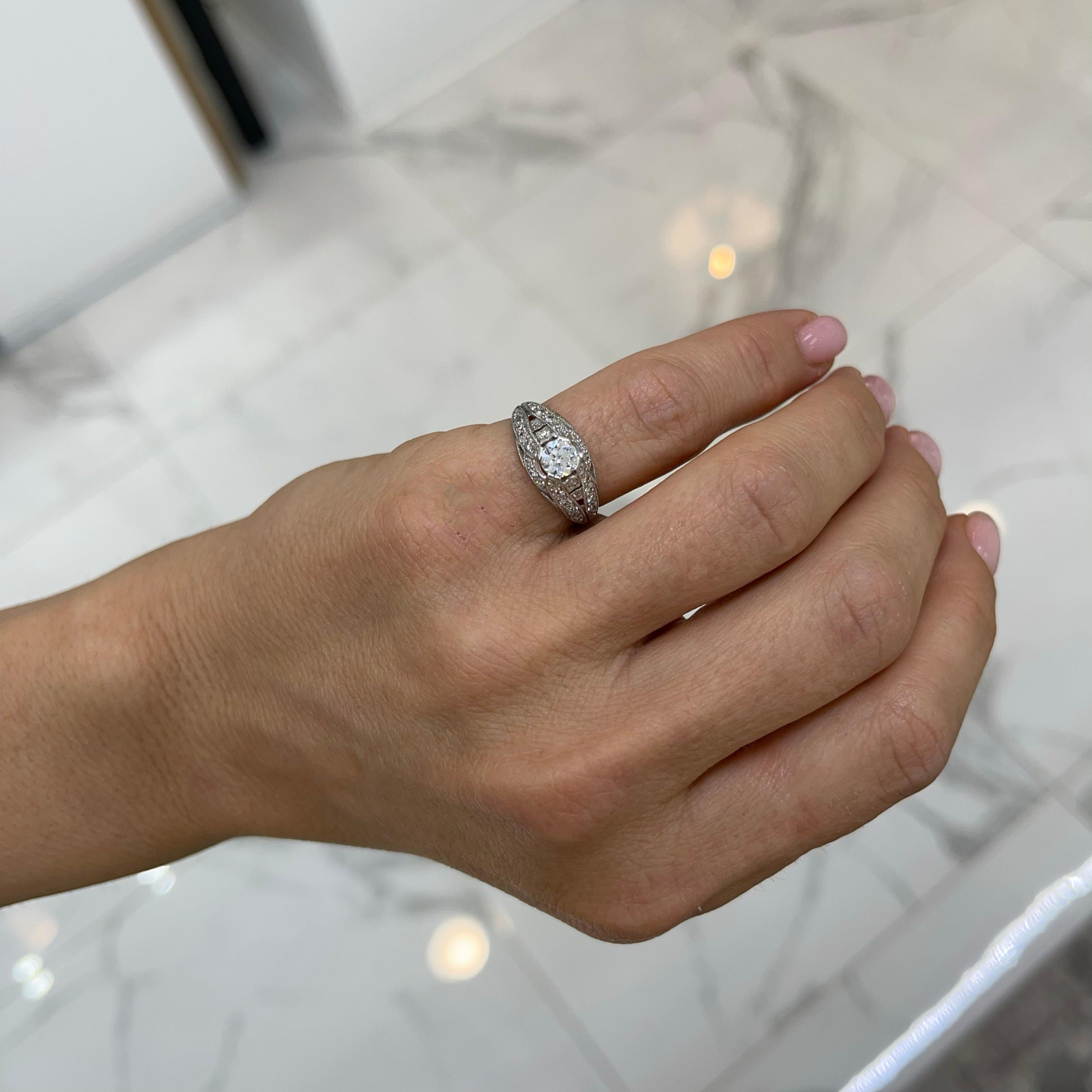 Ladies Antique Art Deco Platinum Filigree Diamond Engagement Ring In Good Condition In Houston, TX