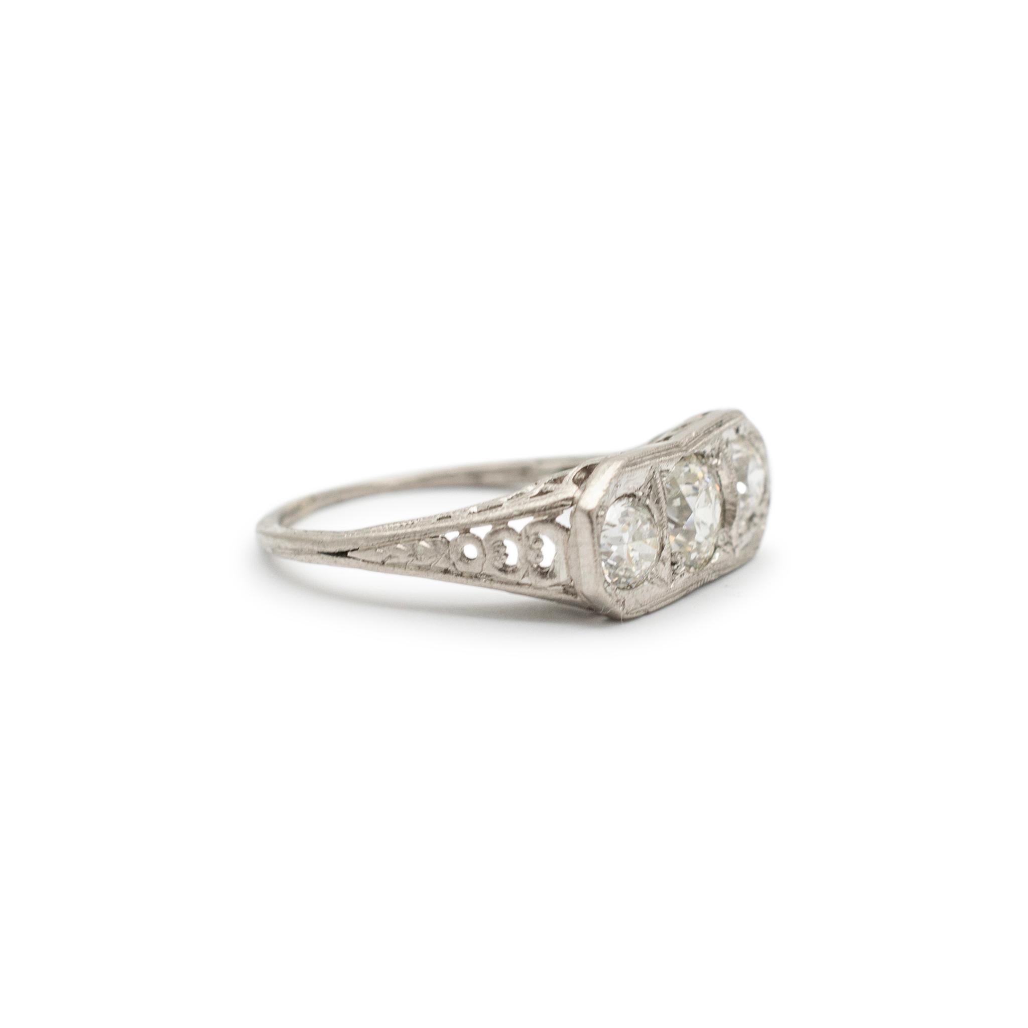 Ladies Antique Art Deco Platinum Filigree Three Stone Diamond Engagement Ring In Excellent Condition For Sale In Houston, TX