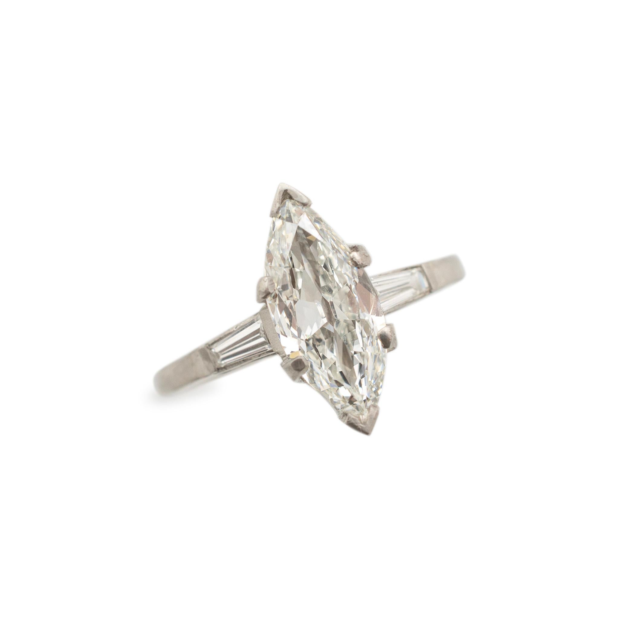 Gender: Ladies

Metal Type: Platinum 

Size: 7

Shank Maximum Width: 2.00 mm

Weight: 4.51 grams

Ladies 900 platinum and iridium diamond antique engagement ring with a half round shank. Engraved with 