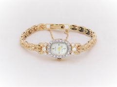 Ladies  14 Karat Gold and Diamond Andre Cheval Wristwatch