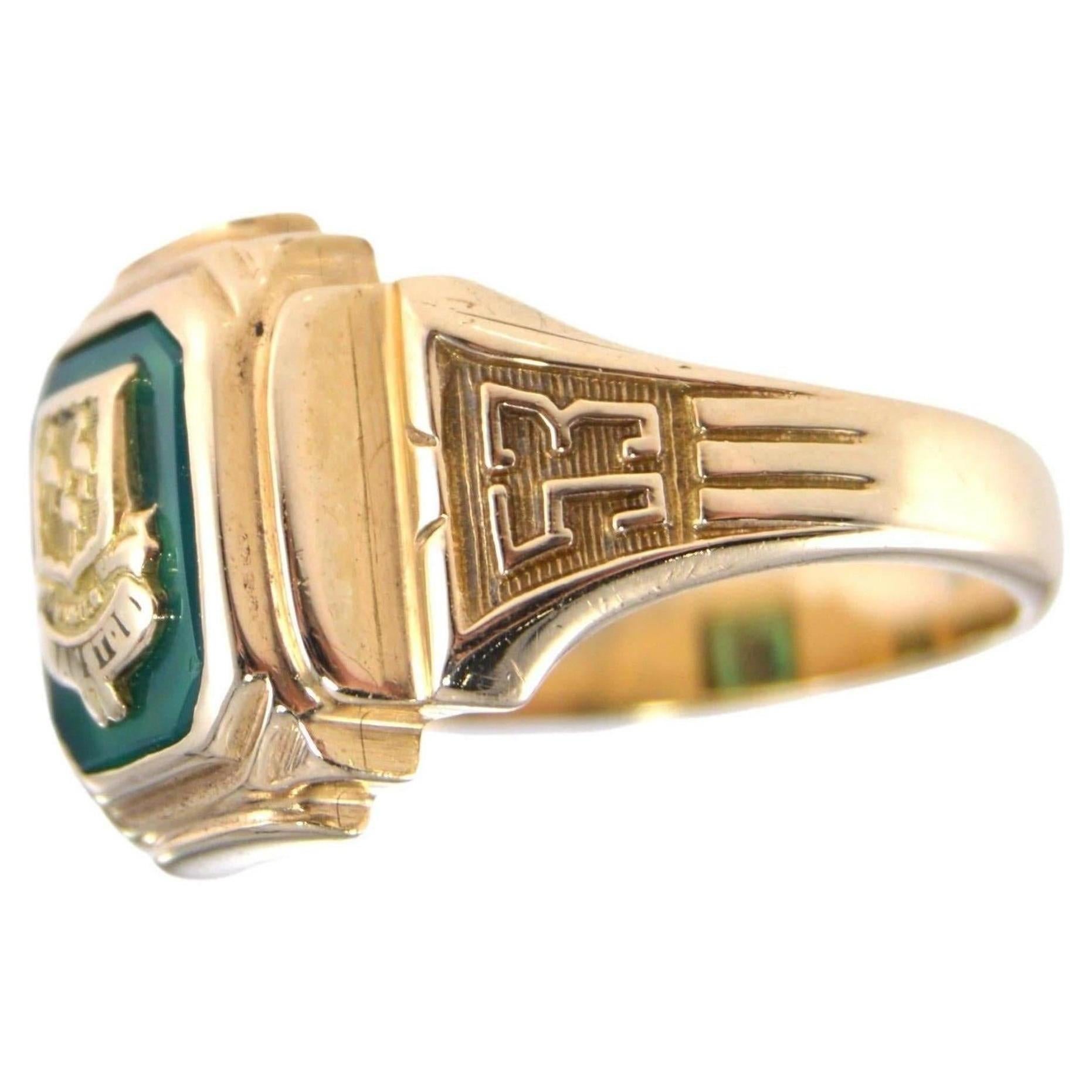 UNISEX RING
STYLE / REFERENCE: Art Deco Signet Ring 
METAL / MATERIAL: 10Kt. Solid Yellow Gold 
CIRCA / YEAR: 1953
SIZE: 6

This great looking Academy ring die struck and is done in Solid 10Kt. Richly embossed it is very unique and can easily be