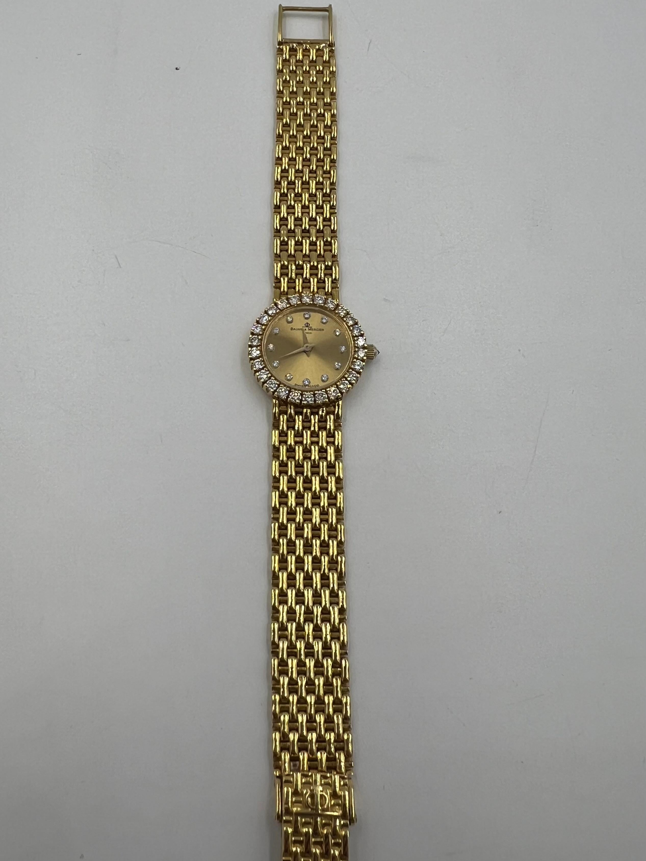 Round Cut Ladies Baume & Mercier Diamond Yellow Gold Wristwatch  For Sale