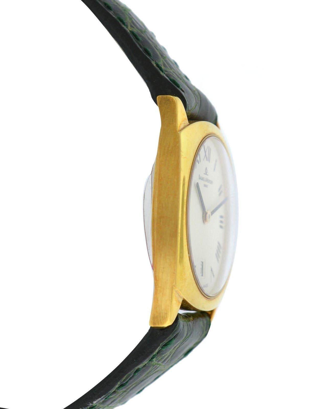 Ladies Baume & Mercier Hampton MOA06627 Solid 18 Karat Gold Quartz Date Watch In New Condition For Sale In New York, NY