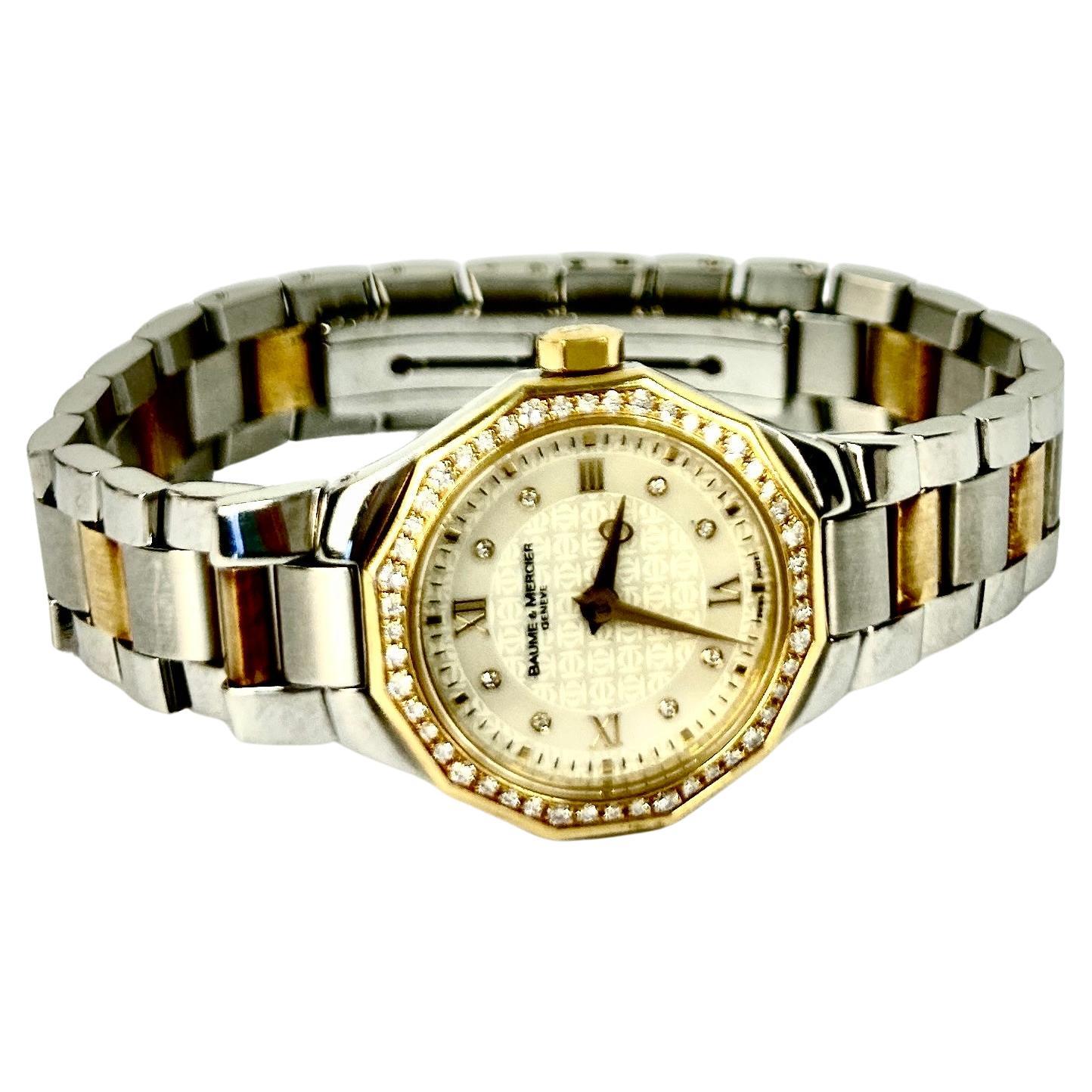 Baume Mercier 18k solide Gelbgold Edelstahl Diamanten Damenuhr.  Läuft gut. Hält die Zeit perfekt ein. Es wird bis zu 5,5 Zoll Handgelenk passen. Ladies Baume et Mercier Geneve 14k Gelbgold Gehäuse und Edelstahl mit  Armbanduhr mit Diamantlünette,