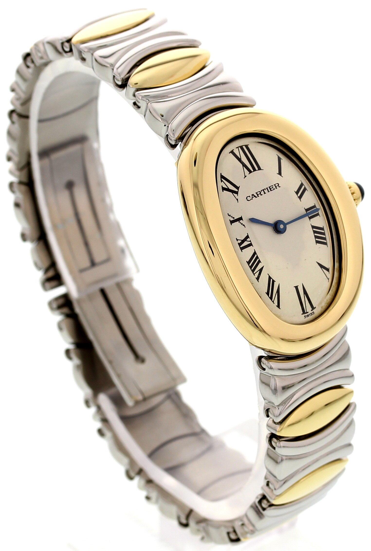 Ladies Cartier Baignoire. 22 mm 18k yellow gold case. 18k yellow gold bezel. White dial with blue hands and black Roman numerals. 18k yellow gold and stainless steel bracelet with hidden double folding clasp; will fit up to a 7 inch wrist. Quartz