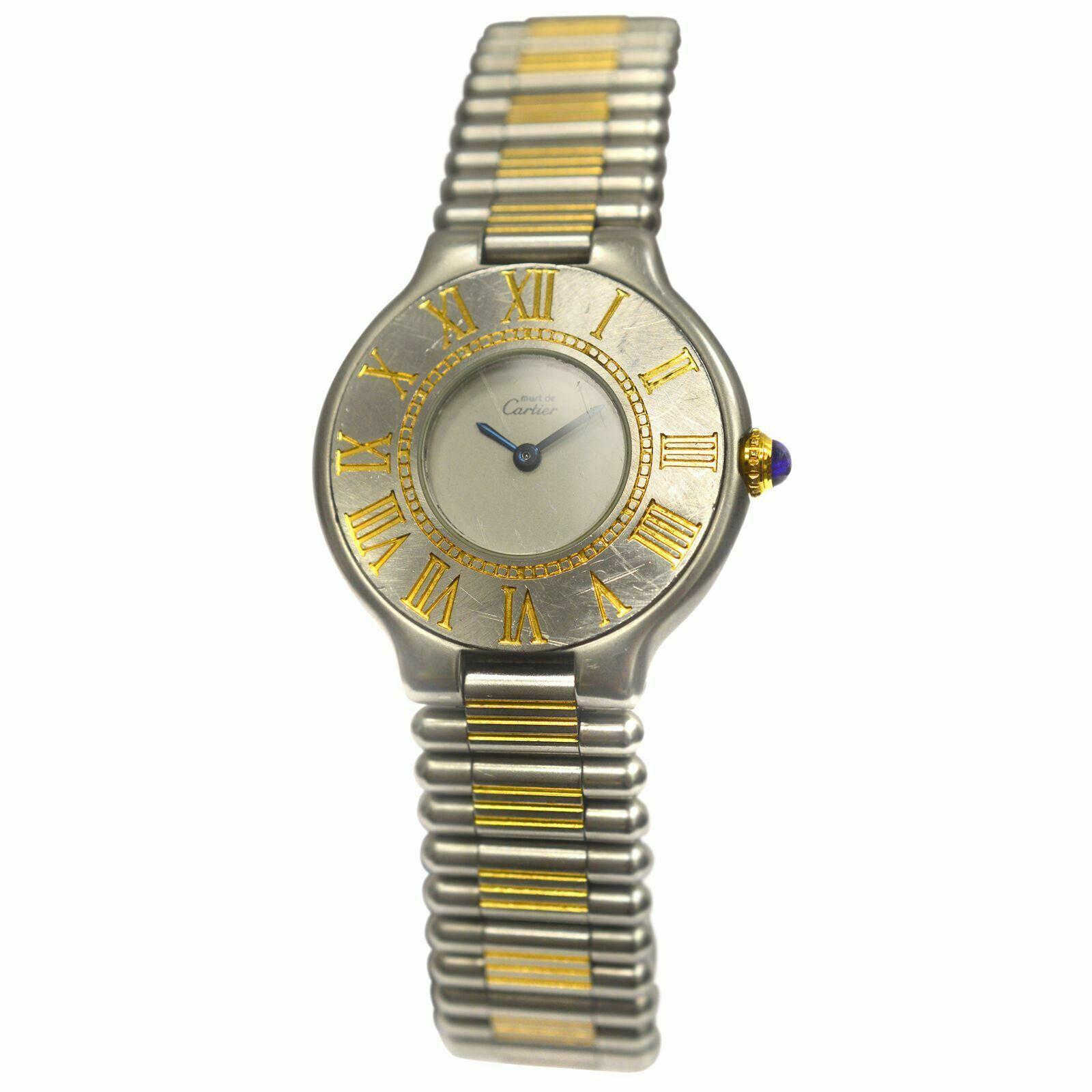Brand	Cartier
Model	Must de Cartier
Gender	Ladies
Condition	Pre-owned
Movement	Swiss Quartz
Case Material	Stainless Steel & 18K Yellow Gold
Bracelet / Strap Material	
Stainless Steel & 18K Yellow Gold

Clasp / Buckle Material	
Stainless Steel