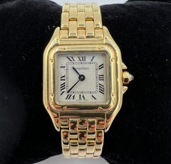Cartier Montre-bracelet Panthère pour femme en or jaune et quartz, petit modèle