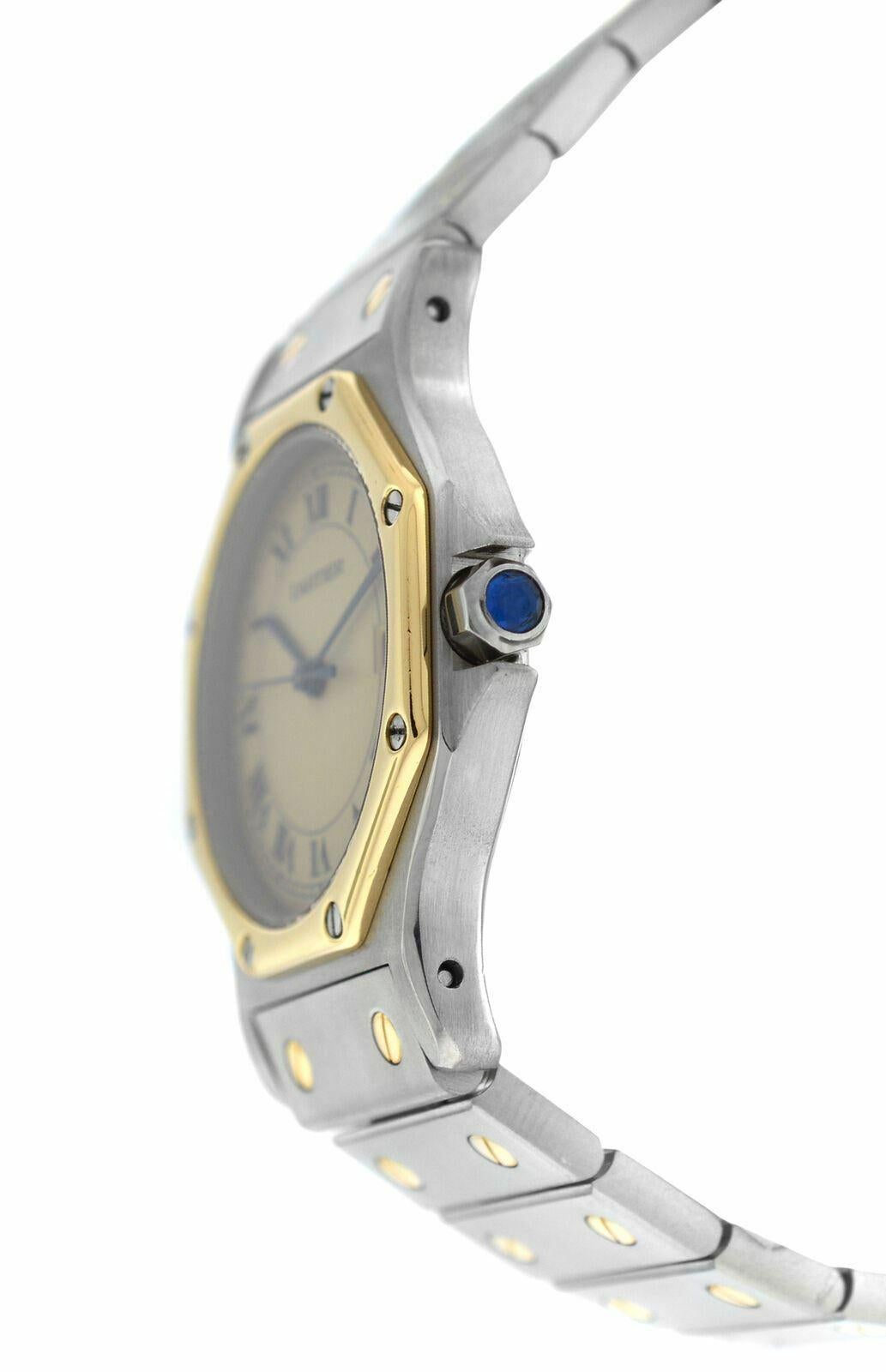 Marke	Cartier
Modell	Santos Achteck 187902
Geschlecht	Damen
Bedingung	Aus Vorbesitz
Bewegung	Schweizer Quarz
Gehäuse MATERIAL	Edelstahl & 18K Gelbgold
Armband / Riemen MATERIAL	
Rostfreier Stahl & 18K Gelbgold

Schließe / Schnalle