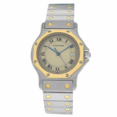 Cartier Montre Santos octogonale en acier et or jaune 18 carats à quartz, pour femmes