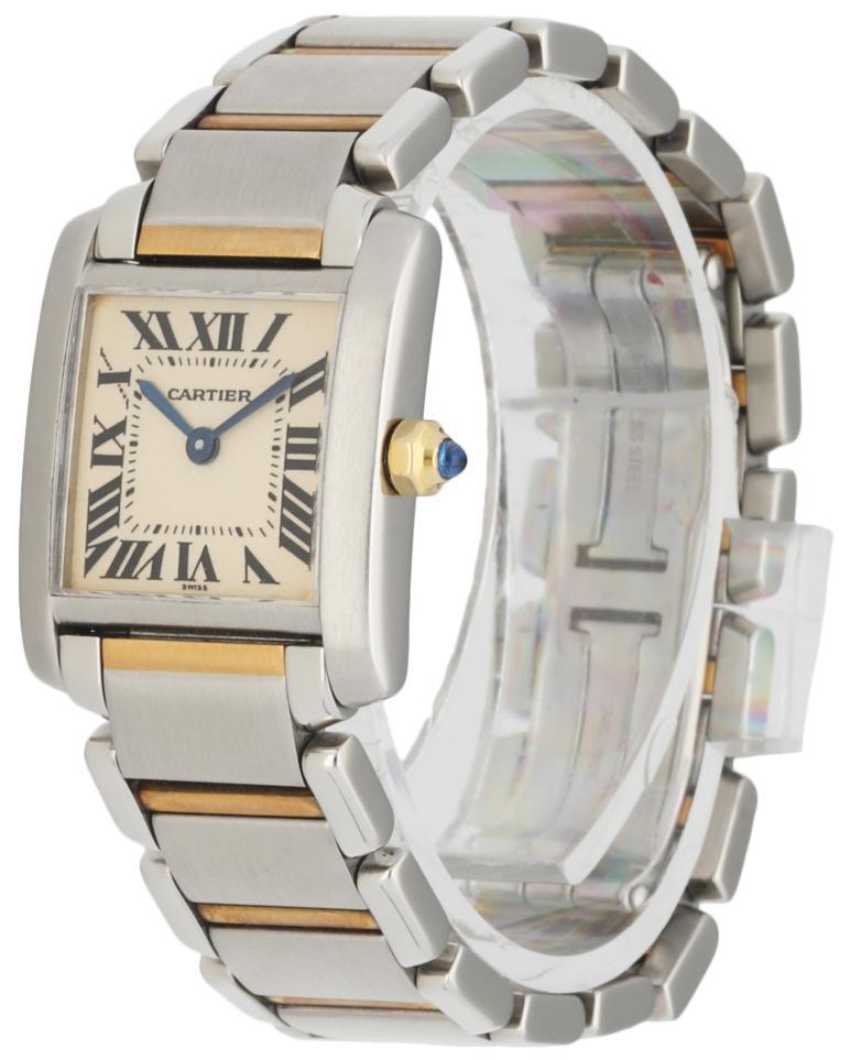 Ladies Cartier Tank Francaise 2300. 20mm stainless steel case. Stainless Steel smooth bezel. Off-White dial with Blue steel hands and Roman numeral hour markers. Minute markers on the inner dial. Stainless Steel & 18k Yellow Gold Bracelet with