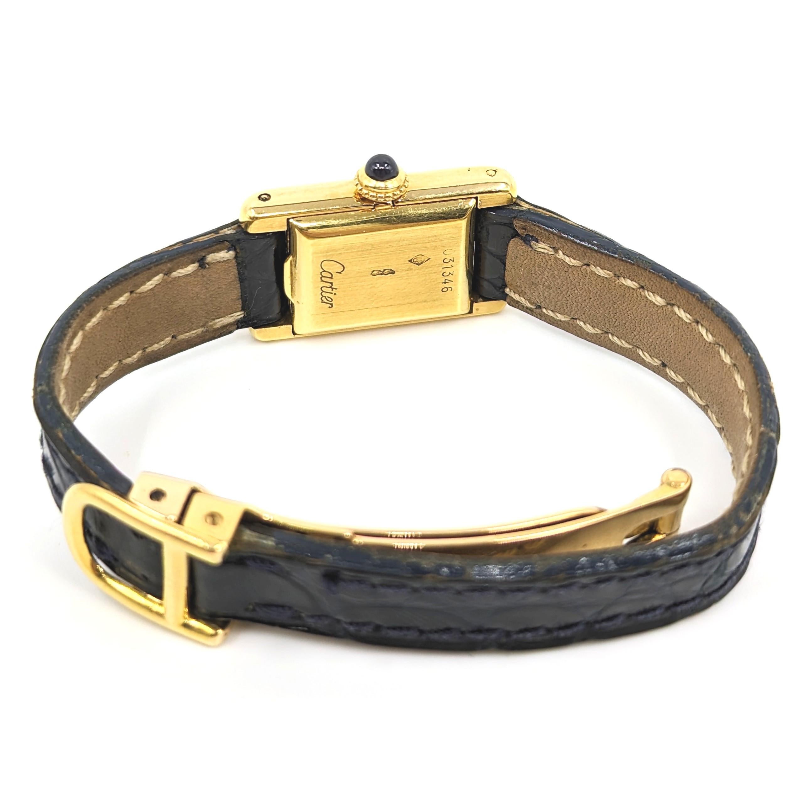 A rare ladies Cartier 18k solid yellow gold Tank PARIS with original Cartier signed 18k deployment clasp

This highly desirable solid gold Cartier watch features the original Cartier Tank 
